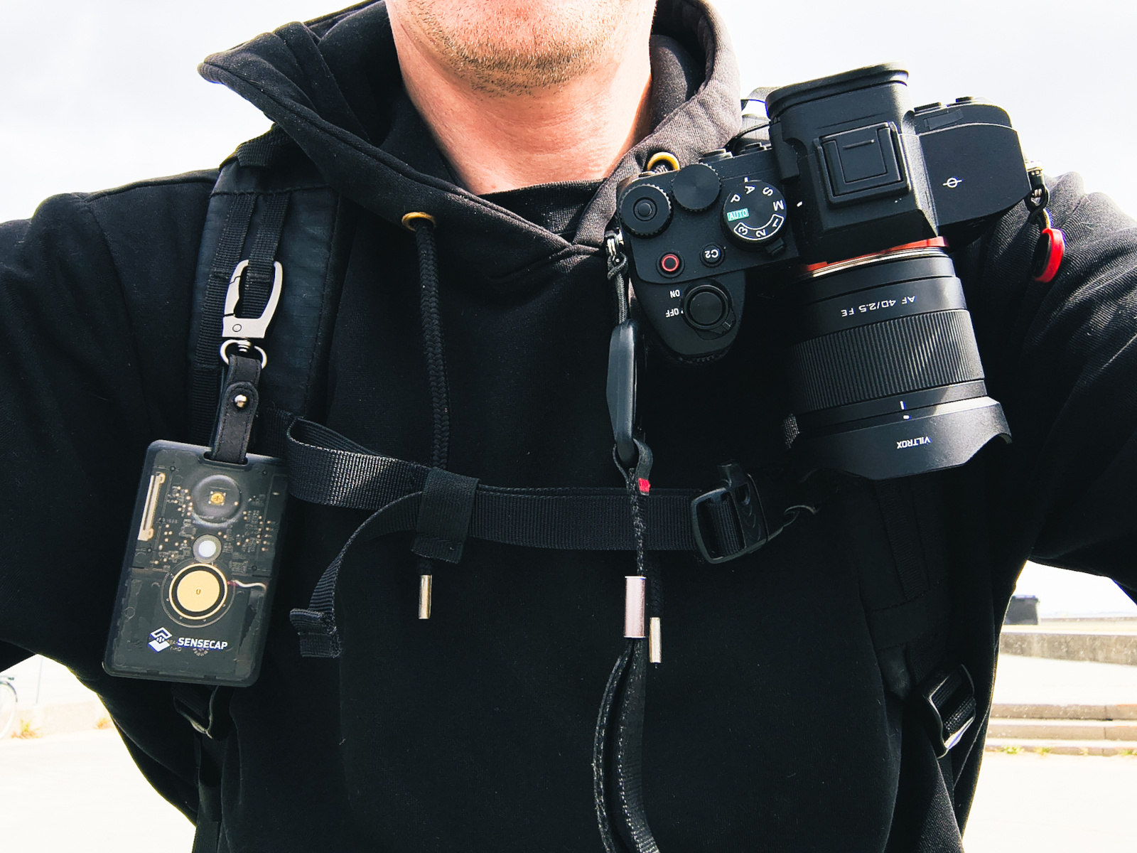 A picture of the Sensecap T1000E clipped to my backpack
